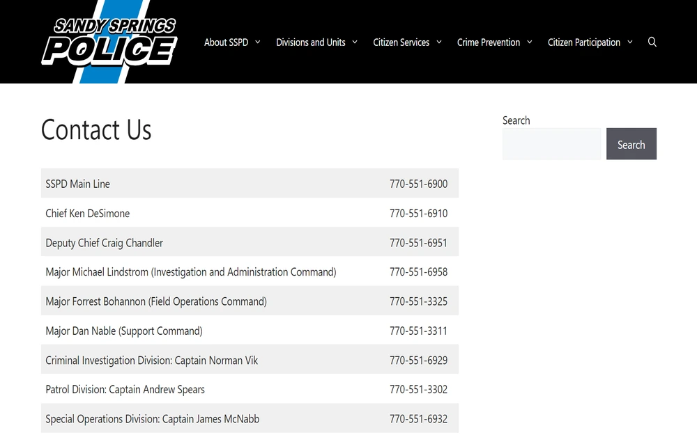 A screenshot of a contact list from the Sandy Springs Police Department's webpage featuring phone numbers and names for the main line, Chief, Deputy Chief, Majors of various divisions, and Captains of the Criminal Investigation, Patrol, and Special Operations Divisions.